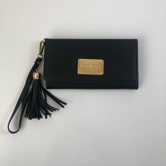 bebe Handbags - Bebe black tasseled wallet